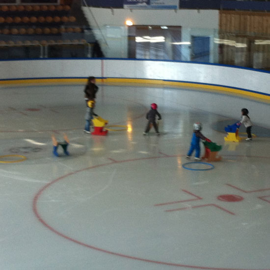 Ice skating at my weekly lesson - I'm in blue with white helmet